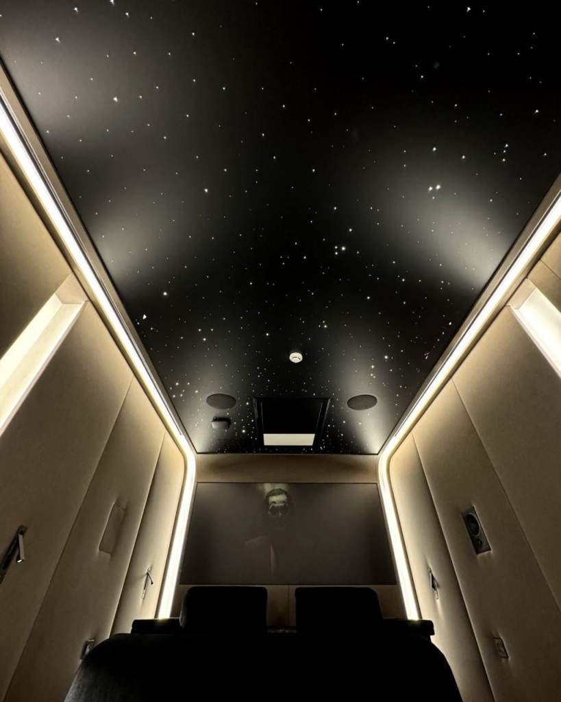 Modern home cinema with intelligent lighting control, premium audio system, luxury seating, and elegant ceiling design. A turnkey entertainment solution by Pioner Group. Modern home cinema with intelligent lighting control, premium audio system, luxury seating, and elegant ceiling design. A turnkey entertainment solution by Pioner Group.