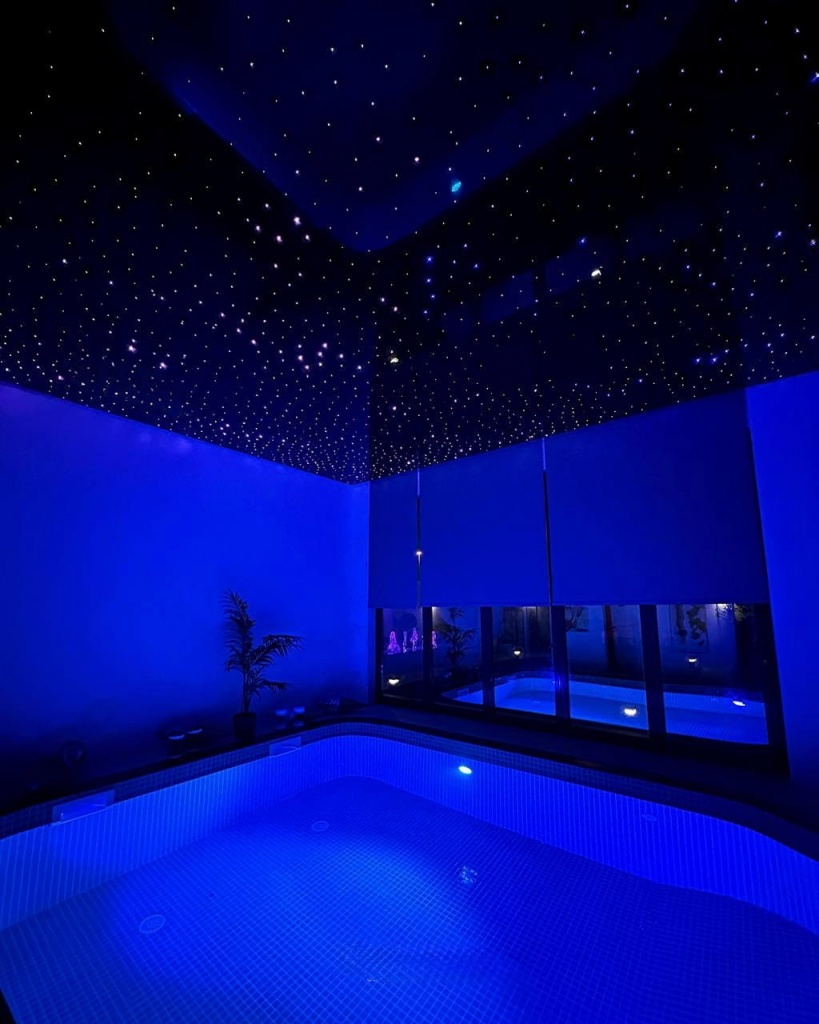 Custom Fiber Optic Ceiling with realistic star lighting reflected across the swimming pool. Custom Fiber Optic Ceiling with realistic star lighting reflected across the swimming pool.