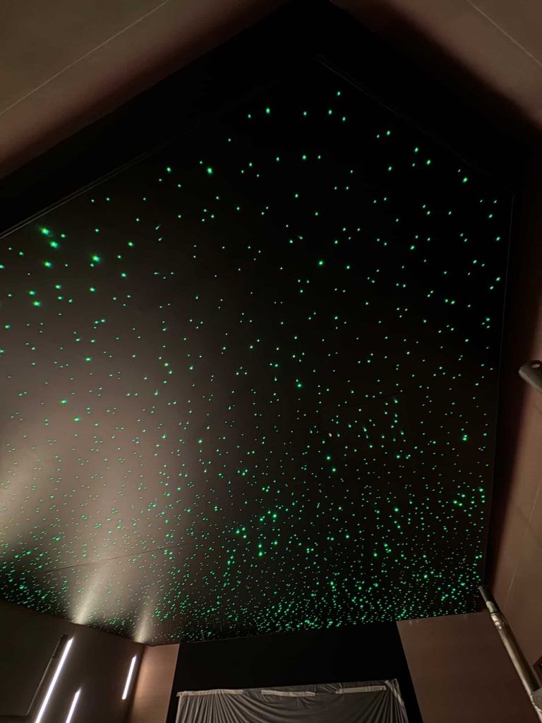 Custom-designed black stretch ceiling featuring thousands of fiber optic stars for a luxury VIP lounge in Dubai. Custom-designed black stretch ceiling featuring thousands of fiber optic stars for a luxury VIP lounge in Dubai.