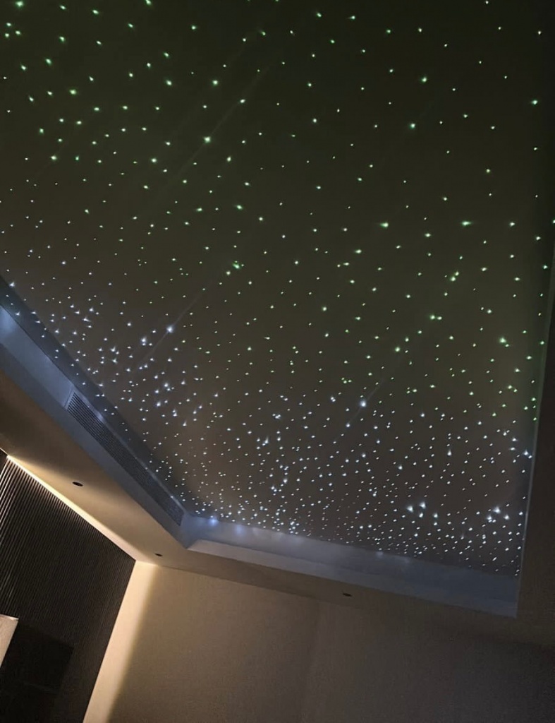 High-density fiber optic ceiling with hundreds of white and colored star points creating a realistic night-sky effect. High-density fiber optic ceiling with hundreds of white and colored star points creating a realistic night-sky effect.
