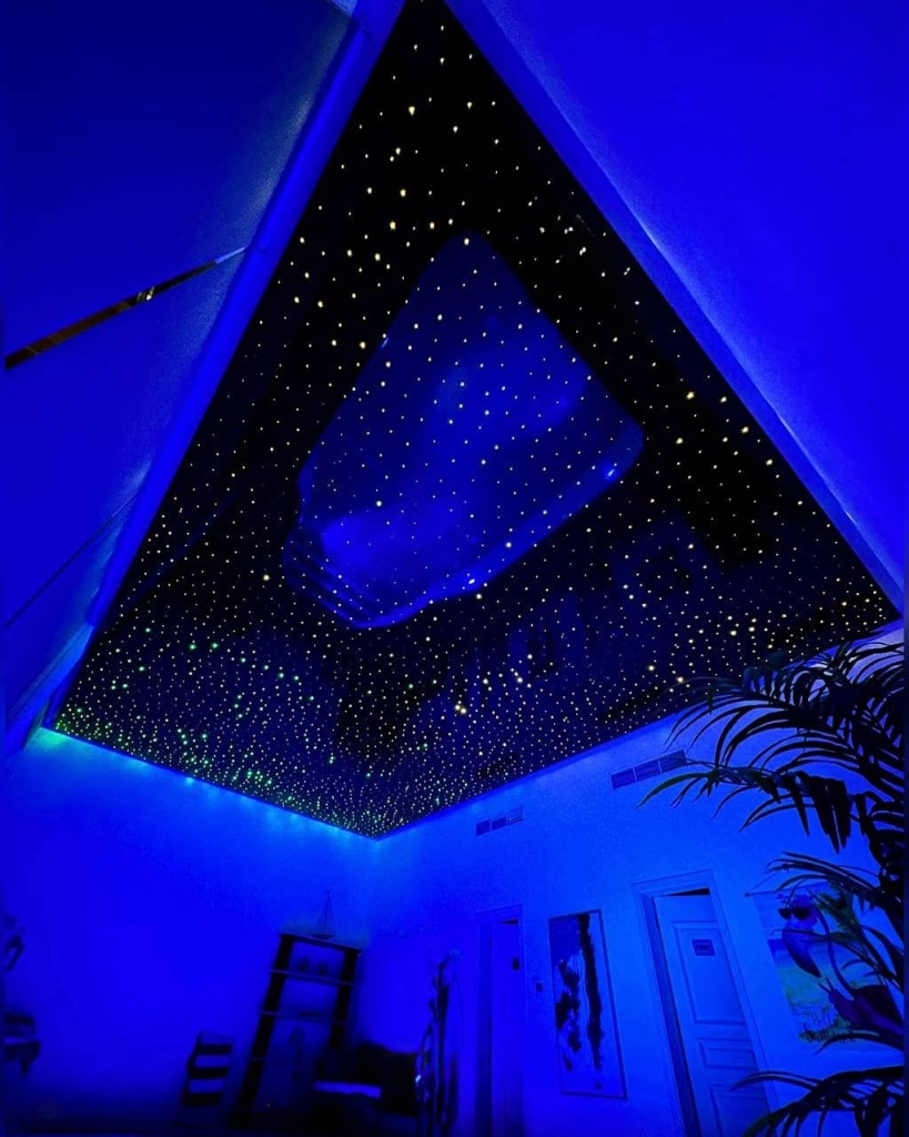 Luxury Fiber Optic Ceiling above an indoor swimming pool with thousands of illuminated stars. Luxury Fiber Optic Ceiling above an indoor swimming pool with thousands of illuminated stars.