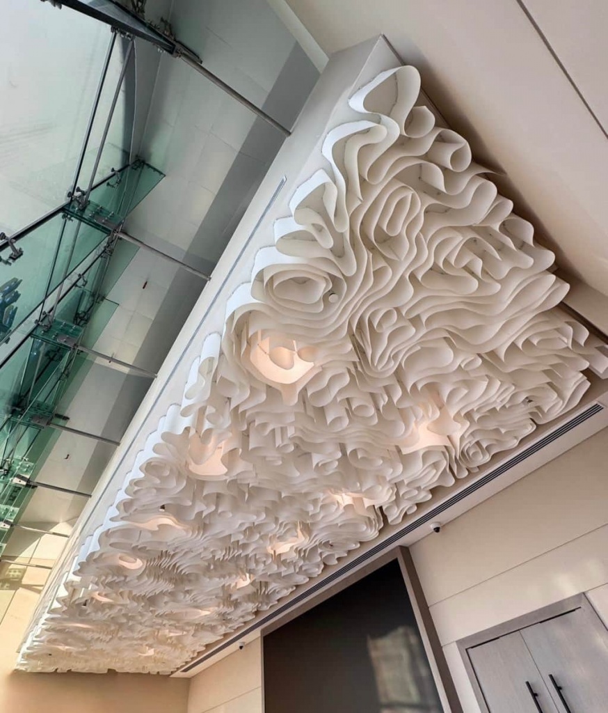 Custom illuminated Wavy Fabric Ceiling designed for a premium commercial environment in Dubai. Custom illuminated Wavy Fabric Ceiling designed for a premium commercial environment in Dubai.