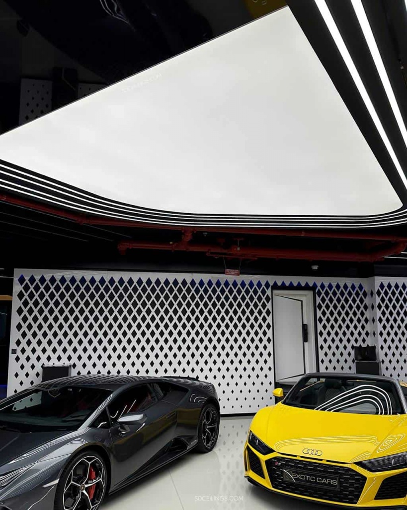 Large custom illuminated ceiling feature integrated into a modern commercial space using a translucent stretch membrane and uniform LED lighting. Large custom illuminated ceiling feature integrated into a modern commercial space using a translucent stretch membrane and uniform LED lighting.