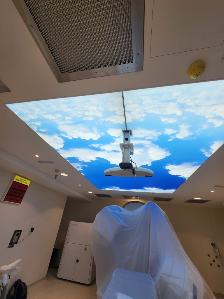 Artificial skylight ceiling with illuminated cloud print installed above medical diagnostic equipment in Abu Dhabi. Artificial skylight ceiling with illuminated cloud print installed above medical diagnostic equipment in Abu Dhabi.