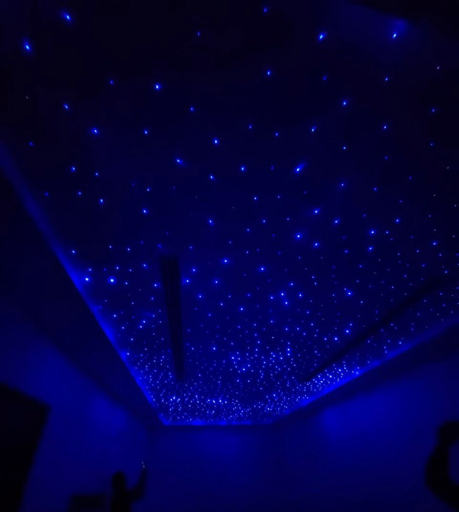 Blue fiber optic star ceiling creating an immersive night-sky effect with hundreds of illuminated points. Blue fiber optic star ceiling creating an immersive night-sky effect with hundreds of illuminated points.