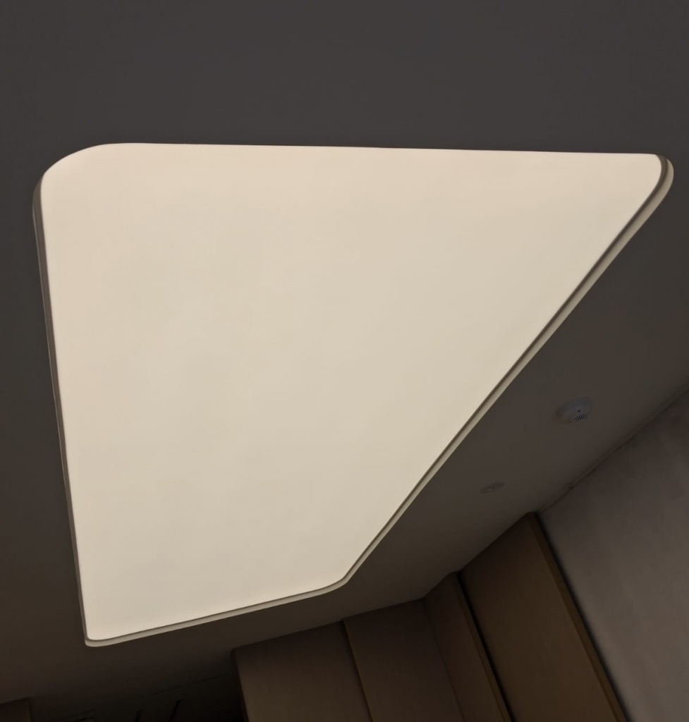 Stretch ceiling membrane installation in Dubai – final stage creating a smooth and perfectly illuminated ceiling surface Stretch ceiling membrane installation in Dubai – final stage creating a smooth and perfectly illuminated ceiling surface