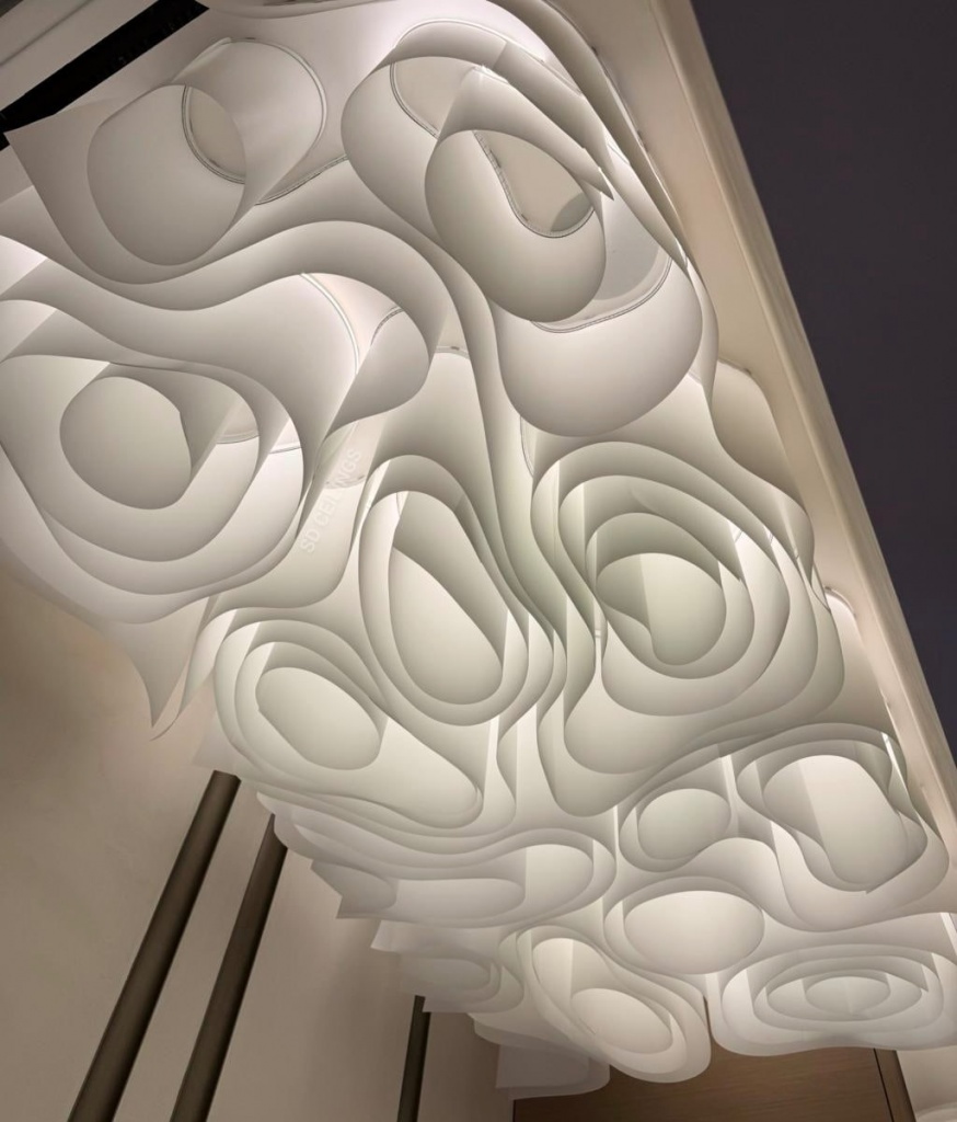 Architectural Wavy Fabric Ceiling creating a sculptural suspended ceiling feature with concealed LED lighting. Architectural Wavy Fabric Ceiling creating a sculptural suspended ceiling feature with concealed LED lighting.