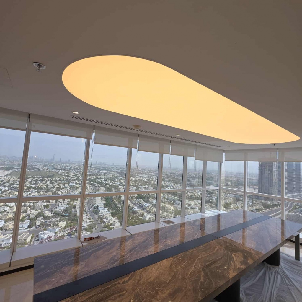 Premium translucent stretch ceiling with concealed LED lighting creating a realistic skylight effect. Premium translucent stretch ceiling with concealed LED lighting creating a realistic skylight effect.