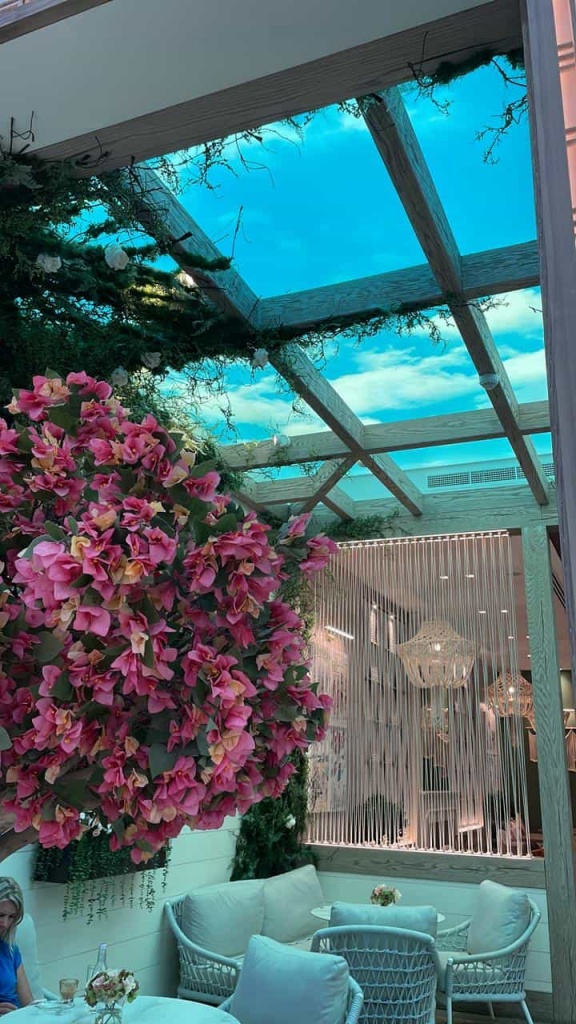Commercial Sky Ceiling combining realistic cloud printing with architectural timber framing for a premium hospitality environment. Commercial Sky Ceiling combining realistic cloud printing with architectural timber framing for a premium hospitality environment.
